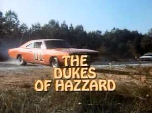 The Dukes of Hazzard cast and General Lee promotional image