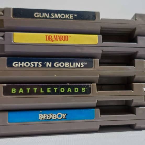 1980s video game cartridges stacked together