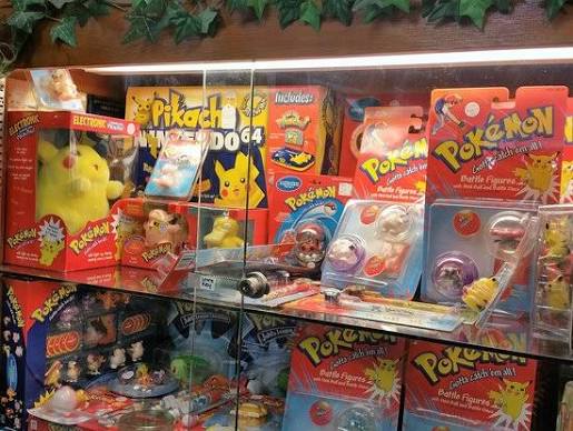 90s toy collector shelves with collectible toys