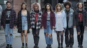 90s grunge fashion flannel ripped jeans boots and alternative style