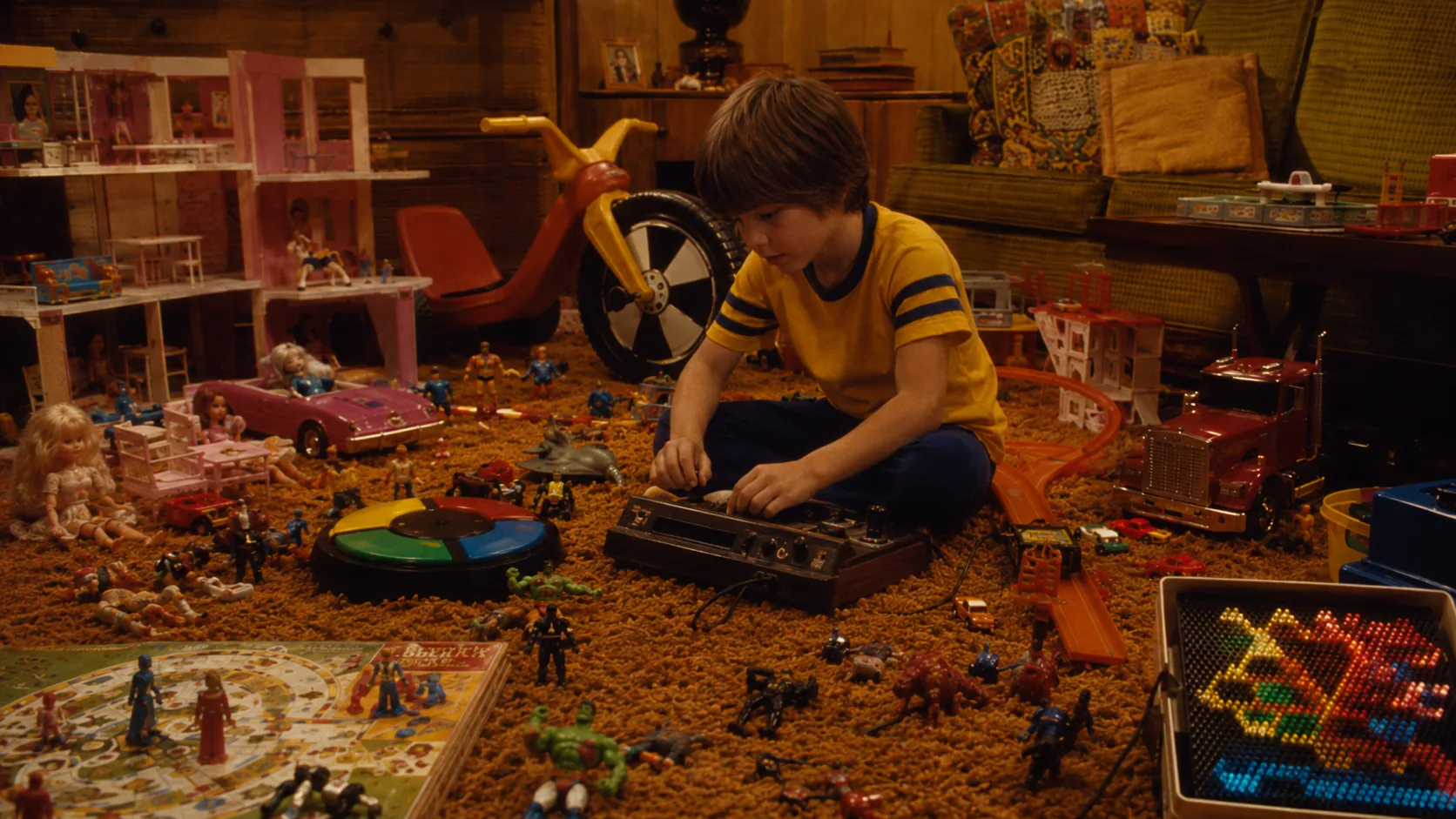 A 1970s family-room carpet covered with the toys that defined the decade