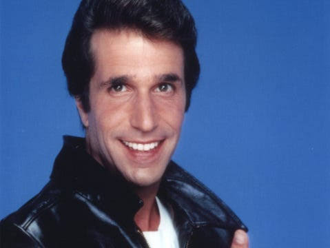 Henry Winkler as Fonzie wearing his black leather jacket