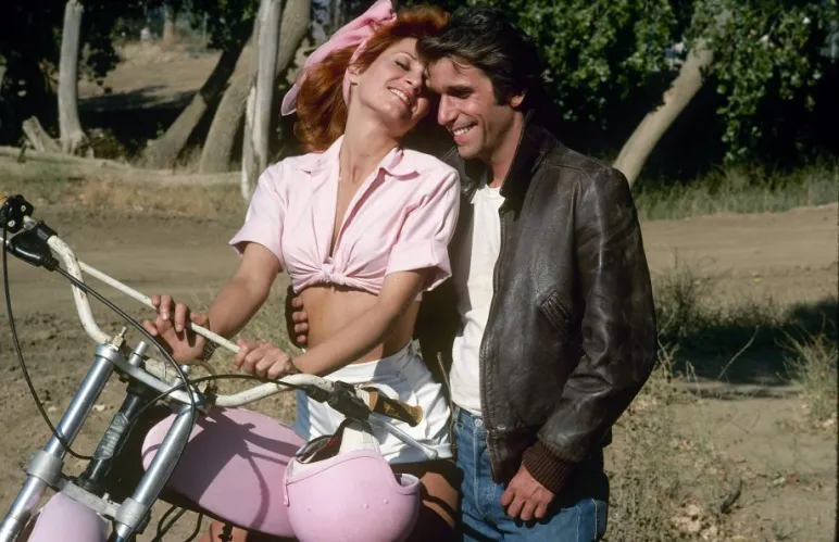 Fonzie with Pinky Tuscadero during the Happy Days demolition derby story