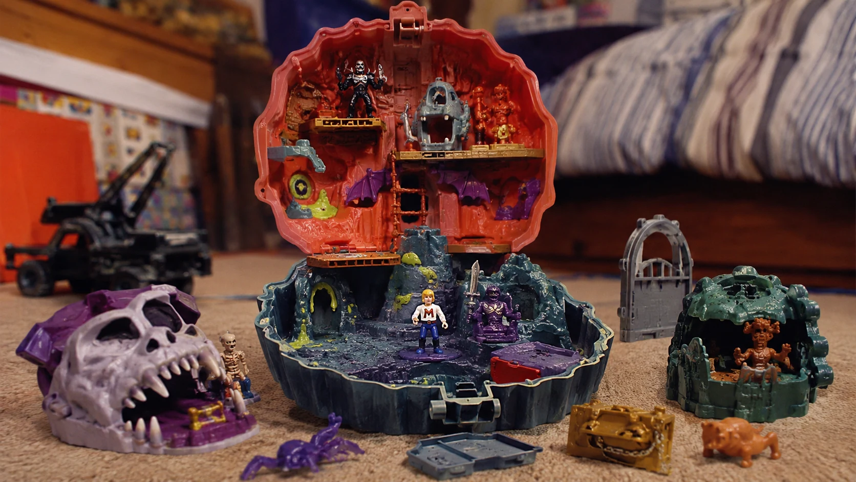 Miniature horror playset inspired by the pocket-sized adventure toys of the 1990s