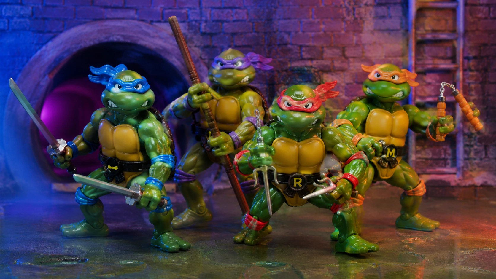 Four original-style Turtle figures posed with blue, purple, red and orange masks and their signature weapons