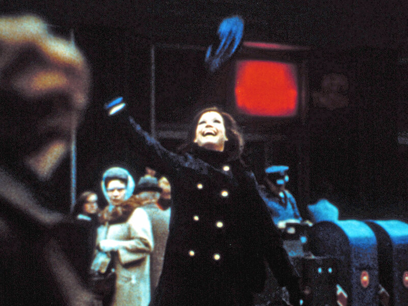 Mary Richards tossing her hat into the air in downtown Minneapolis