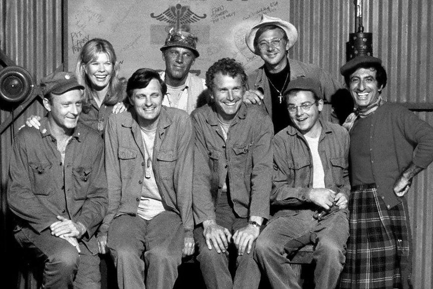 The principal cast of M*A*S*H gathered together in character