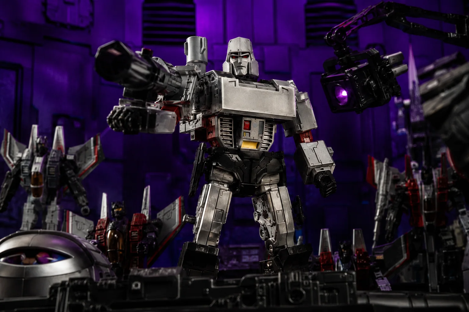 Silver-and-black mechanical villain robot with arm cannon standing in a purple-lit command hangar surrounded by fighter-jet robots.