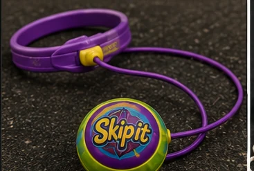 Purple and green Skip-It ankle toy from the 1990s