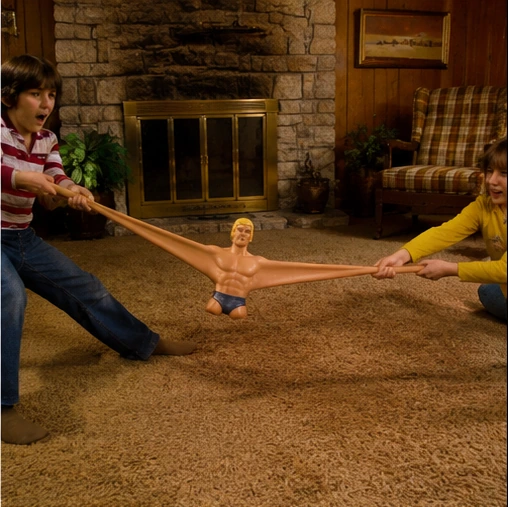 Two children stretching Stretch Armstrong nearly across a 1970s living room