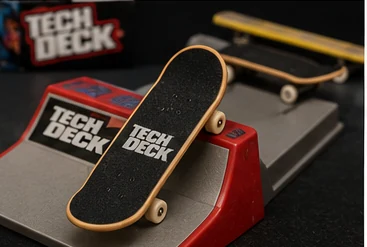 Tech Deck fingerboard and miniature skate ramp from the late 1990s