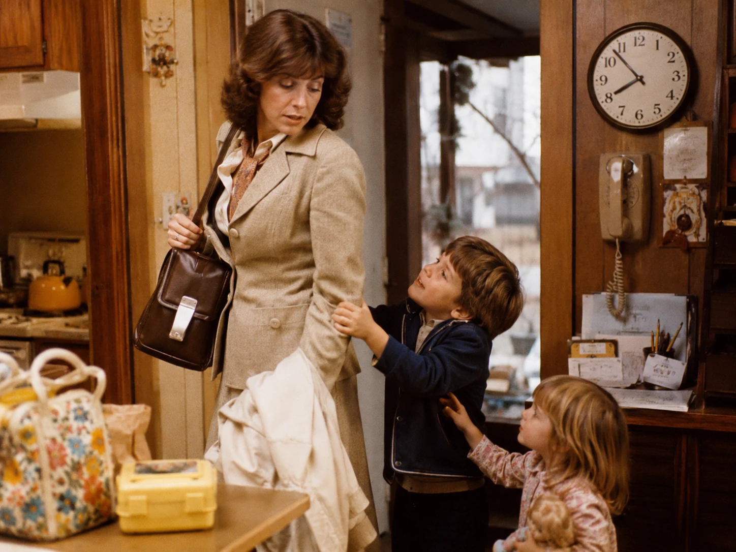 1970s working mother balancing employment and family responsibilities