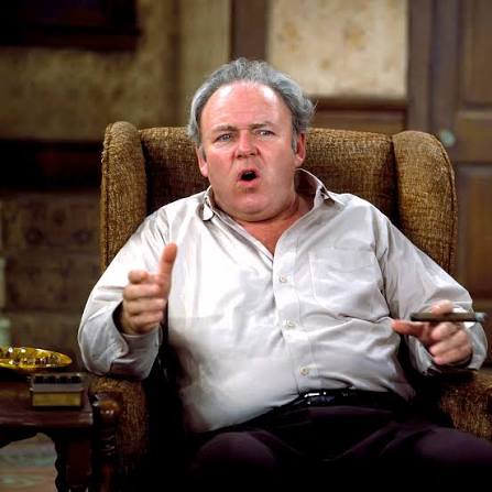 Archie Bunker sitting in his famous living-room chair
