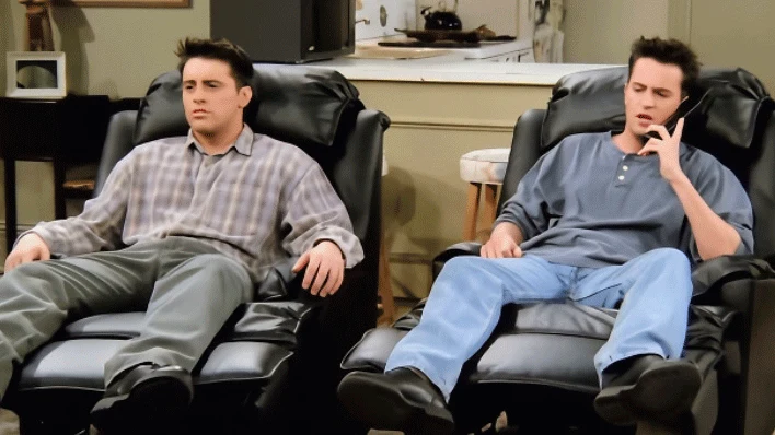 Chandler and Joey sitting in their recliners on Friends
