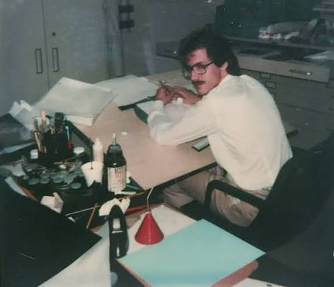 Filmation artist working at a production desk