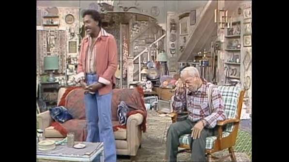 Fred and Lamont Sanford together in their home and junk business