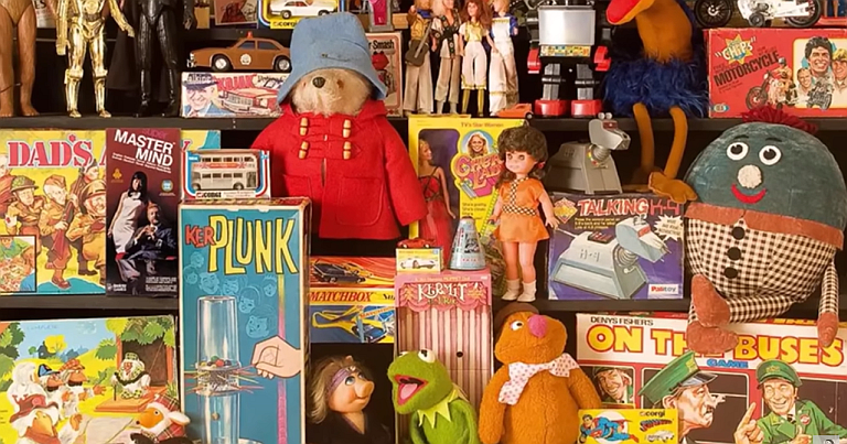 Group of authentic 1970s toy boxes featuring licensed characters and television advertising