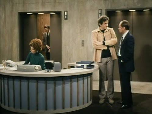 Peter Bonerz as Jerry Robinson and Marcia Wallace as Carol Kester in the office