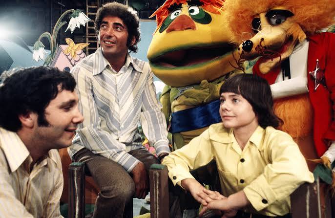 Sid and Marty Krofft with characters or on a Saturday morning television set