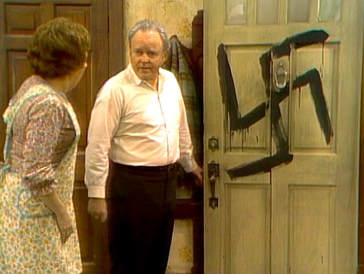 A swastika painted on the Bunker front door in Archie Is Branded