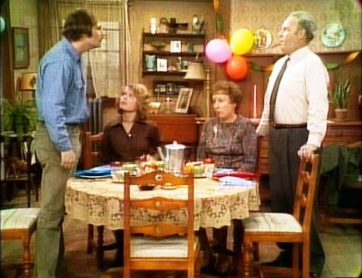 Archie, Edith, Mike and Gloria around the dinner table