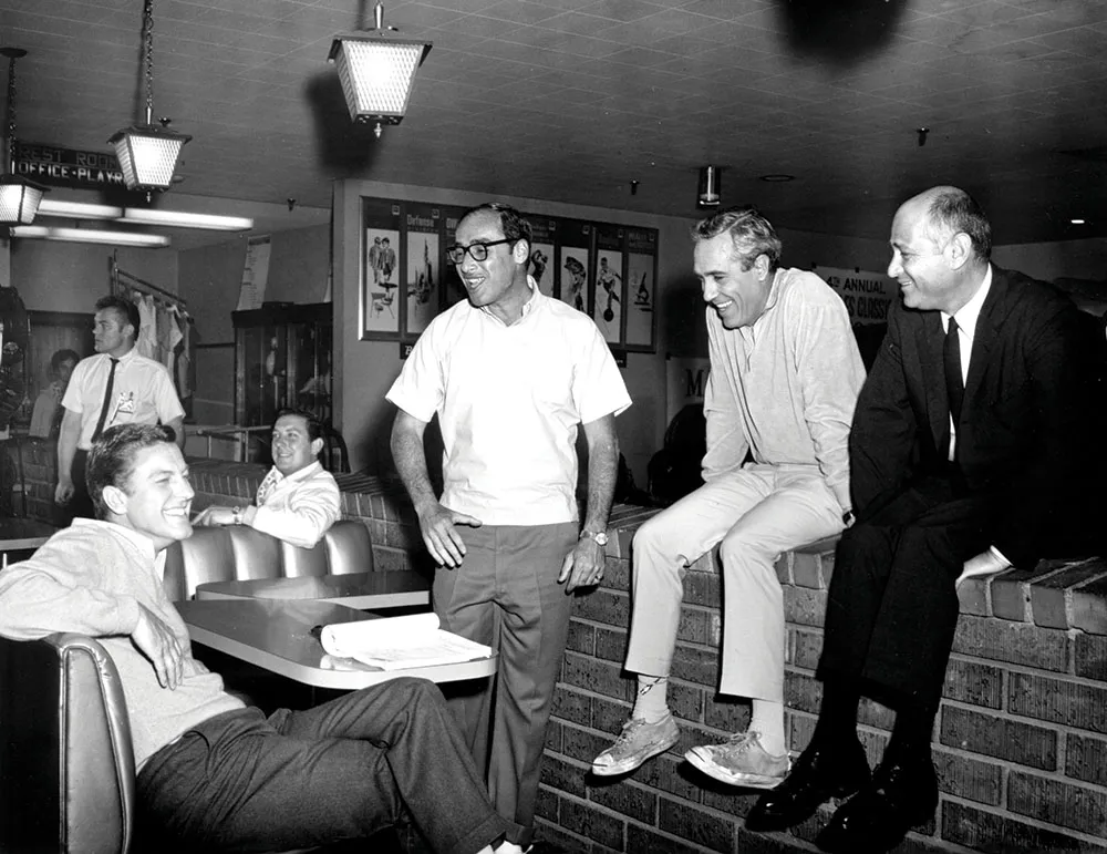 Norman Lear seated with television writers and creative collaborators