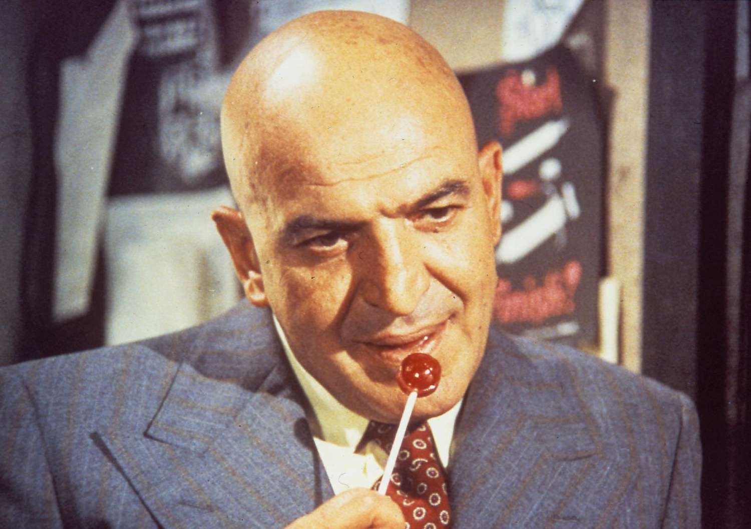 Telly Savalas as NYPD Lieutenant Theo Kojak