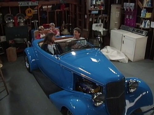 Tim Taylor with his garage hot rod on Home Improvement
