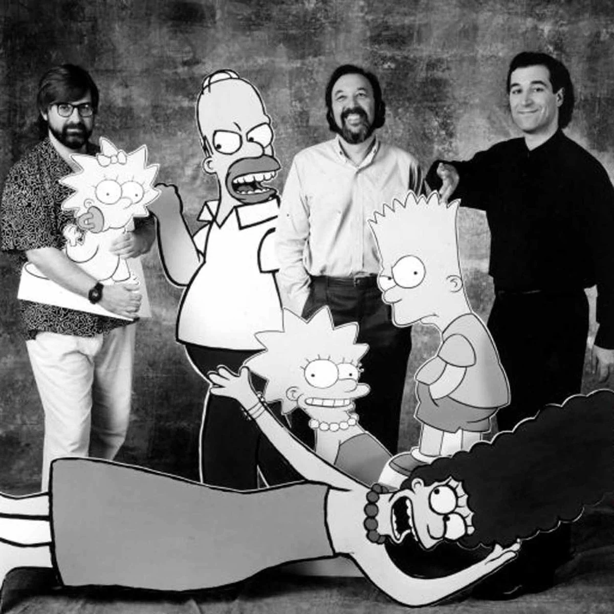 Matt Groening, James L. Brooks and Sam Simon with character cutouts