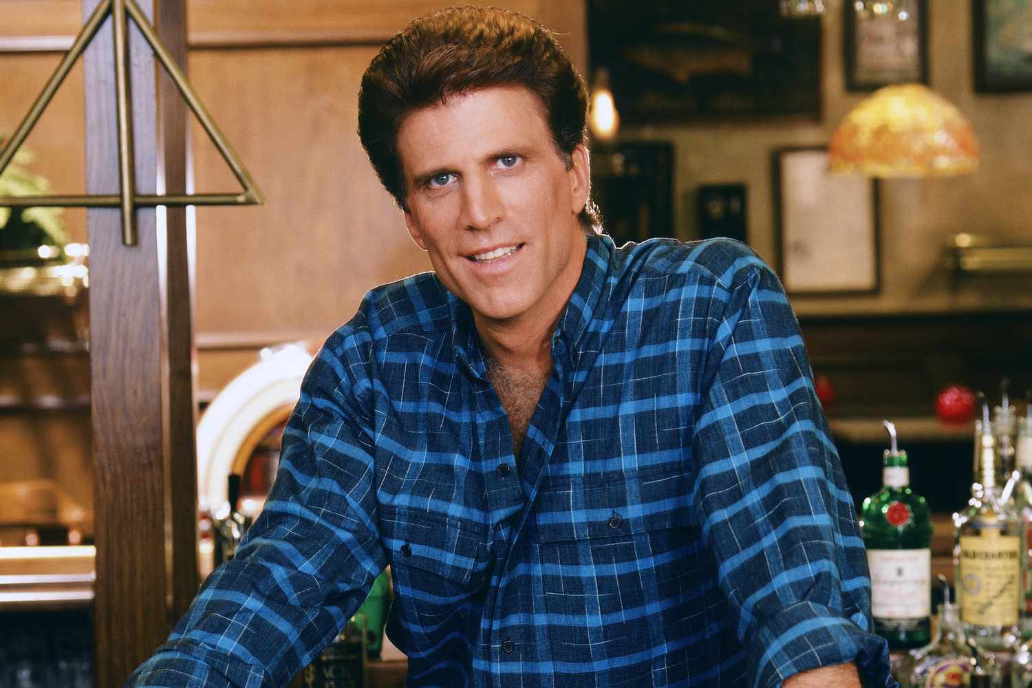 Ted Danson as Sam Malone behind the bar on Cheers